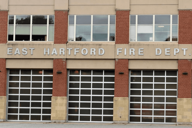 brick building with sign that says East Hartford Fire Department