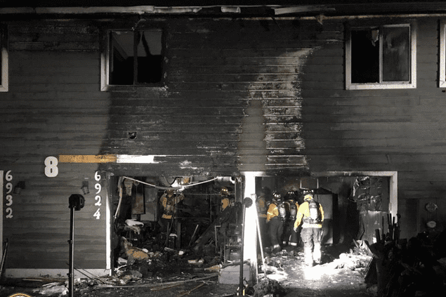 front of an apartment complext after a fire
